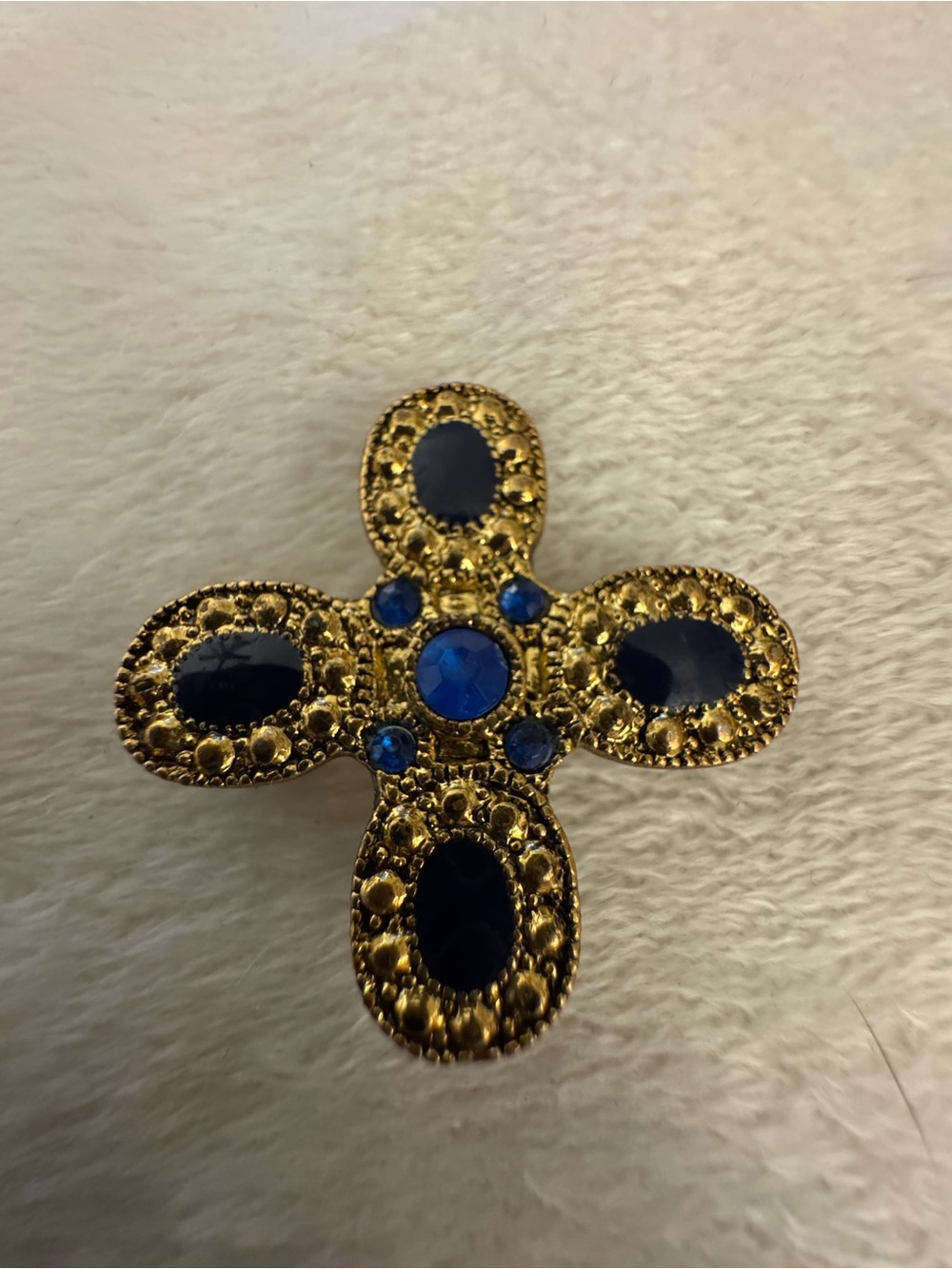 Gold-Tone Cross Brooch with Royal Blue Stones